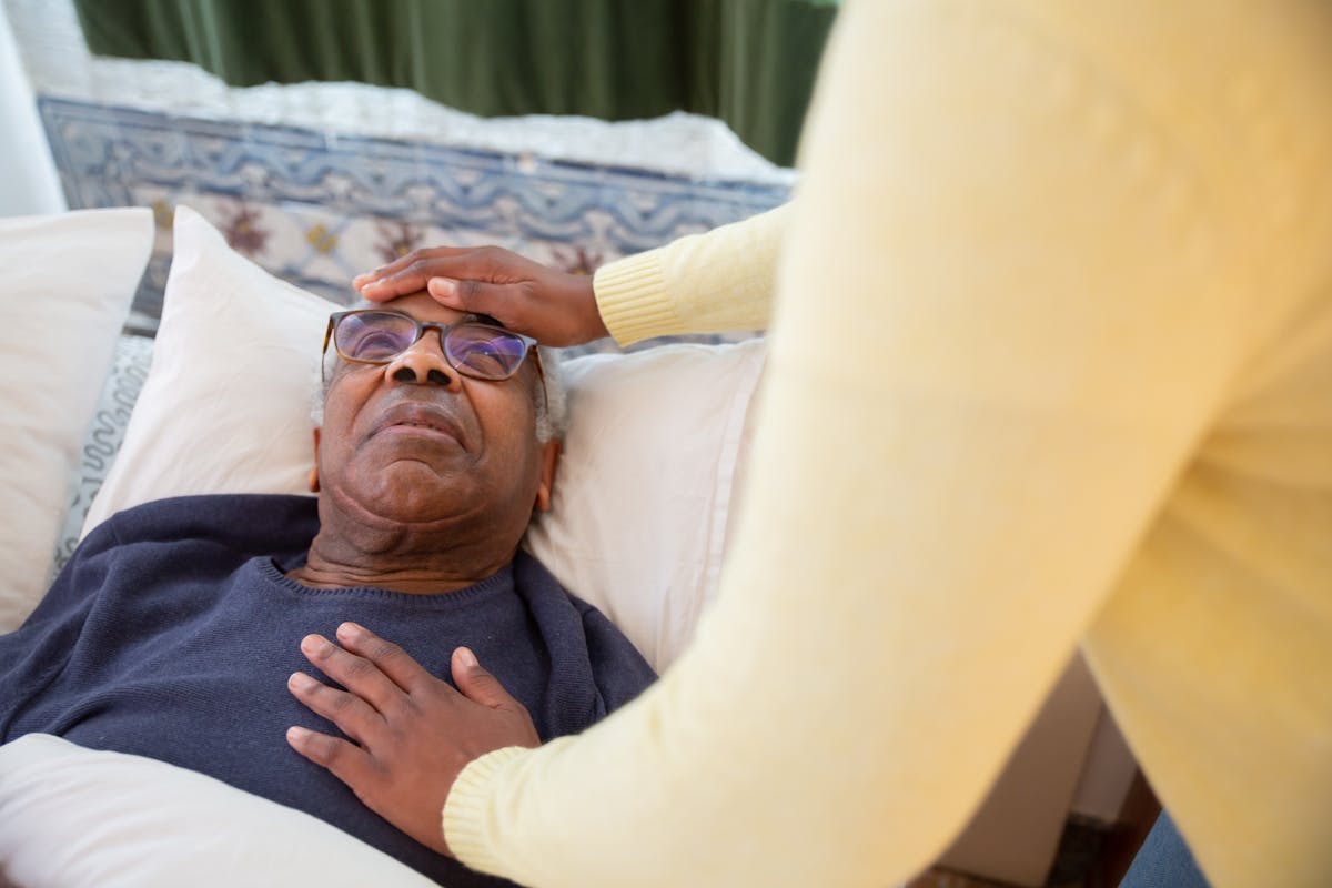 Caregiver supporting a senior at home