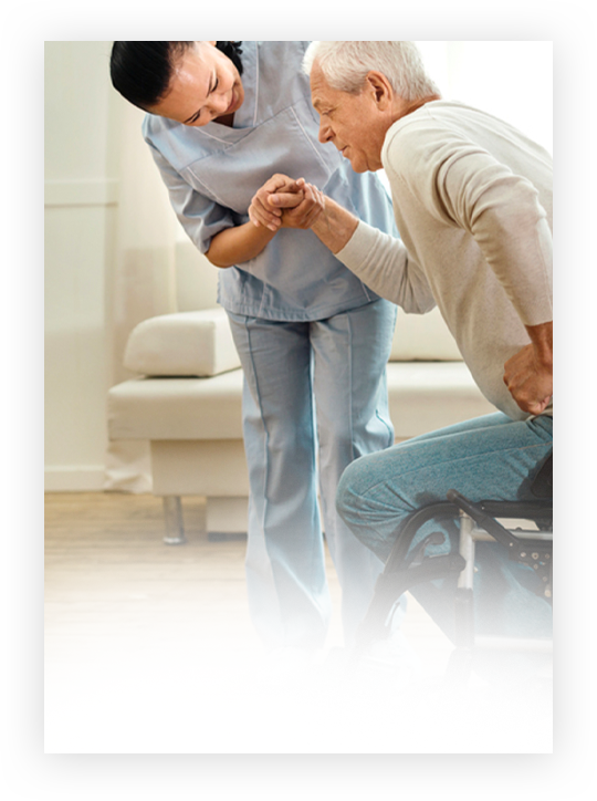 Caregiver helping elderly man with personal care